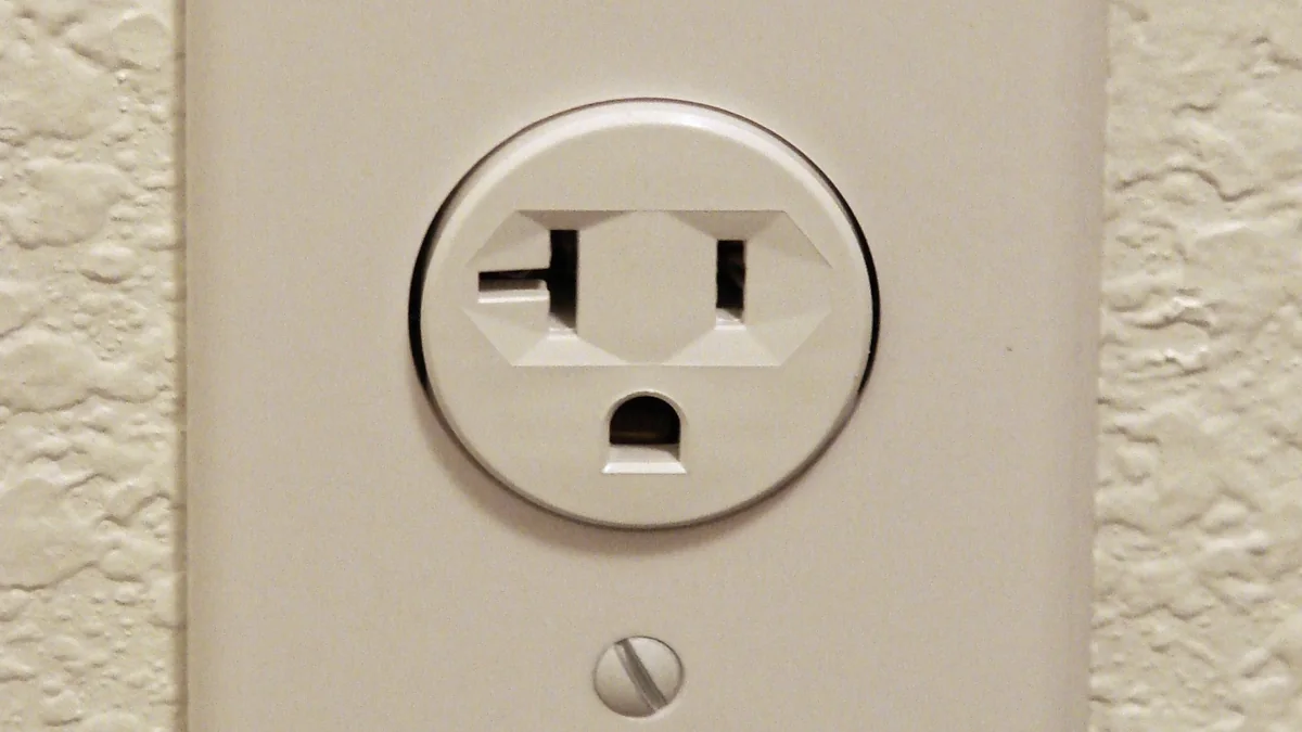 A standard North American wall outlet with two sockets