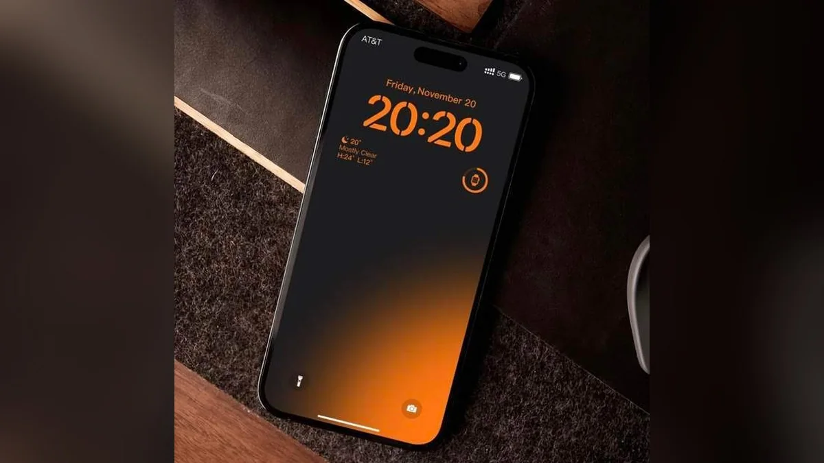iPhone lock screen with a glowing orange clock